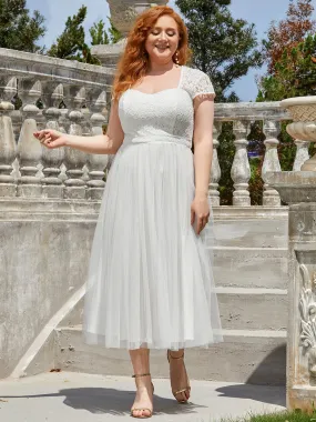 Robe de soirée brodée transparente à manches longues en forme de cœur de grande taille